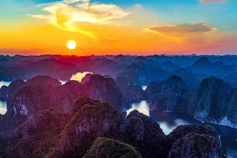 Rowing boats in Bai Tu Long Bay