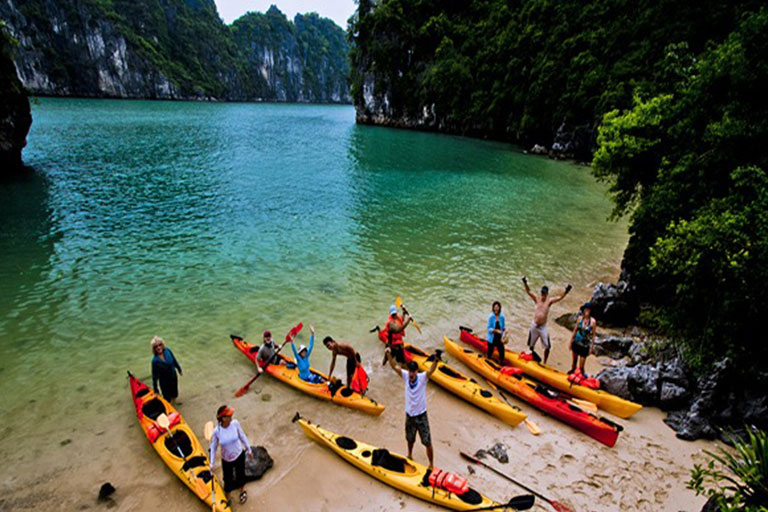 Rowing boats in Bai Tu Long Bay