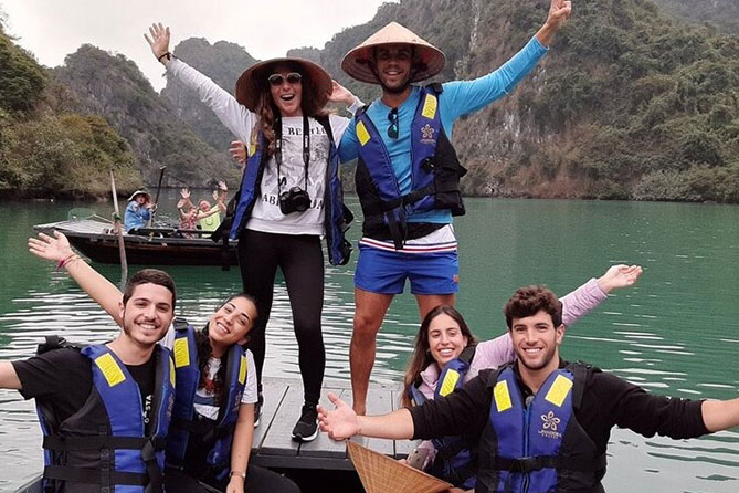 Rowing boats in Bai Tu Long Bay