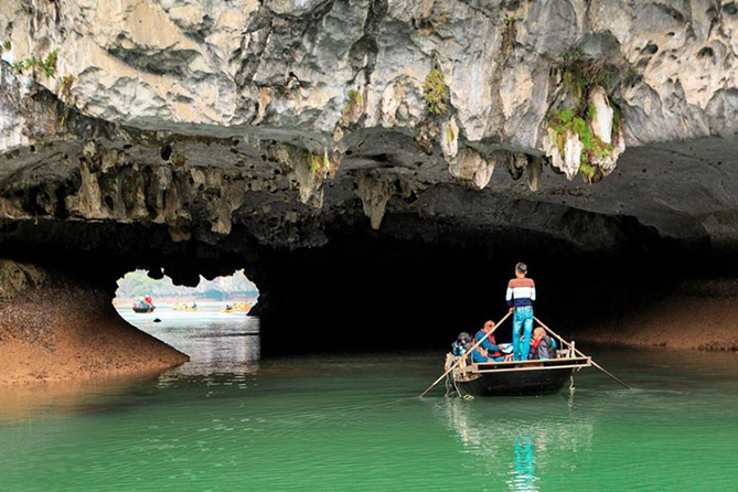 Rowing boats in Bai Tu Long Bay